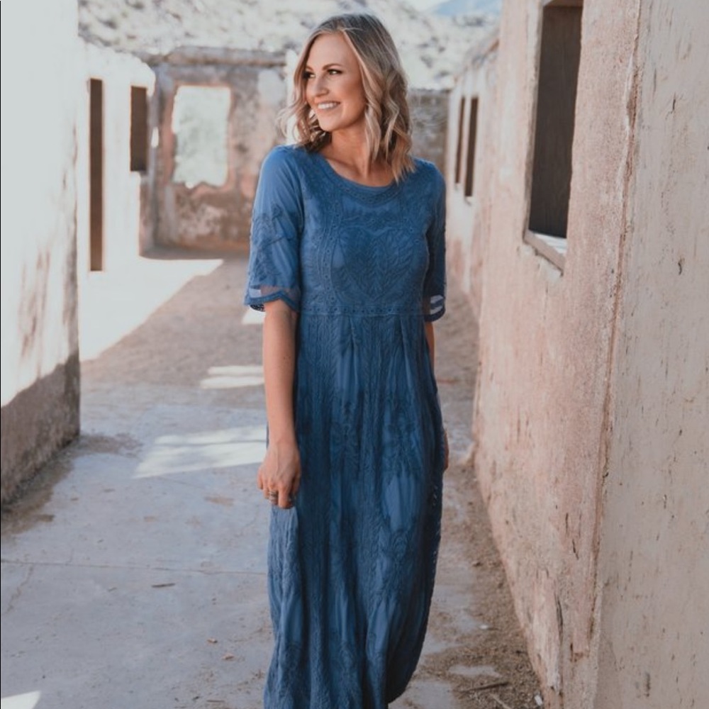 Lace gown in dusty blue